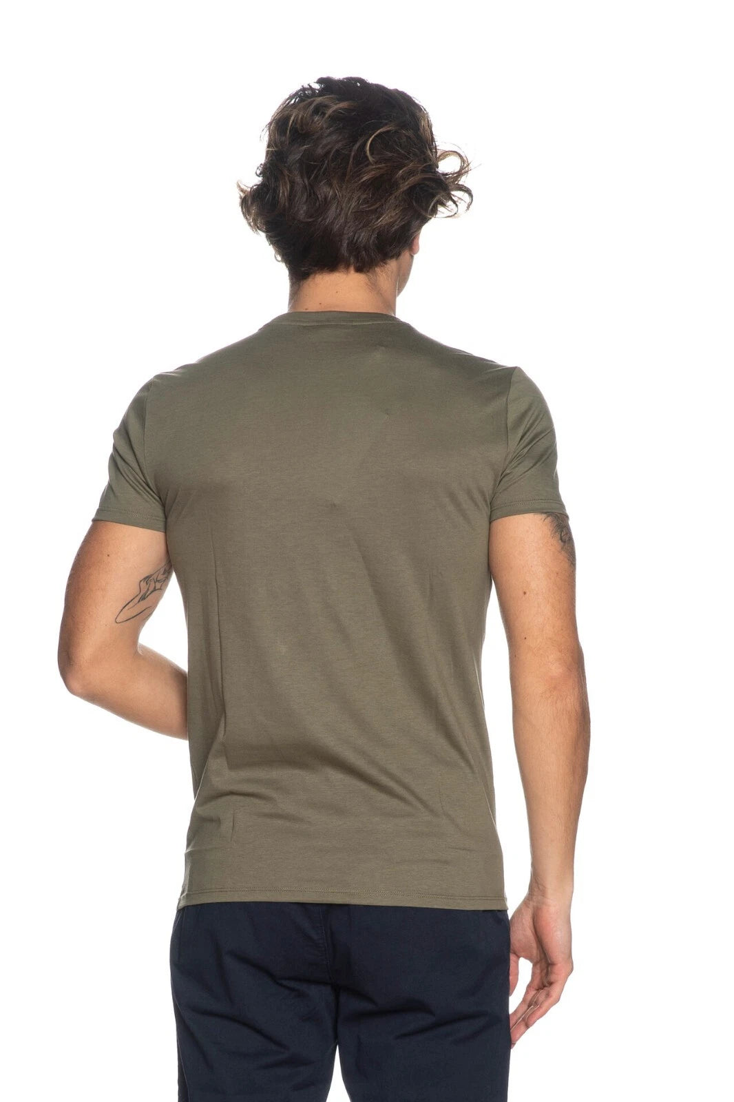 Person wearing a green t-shirt on a white background