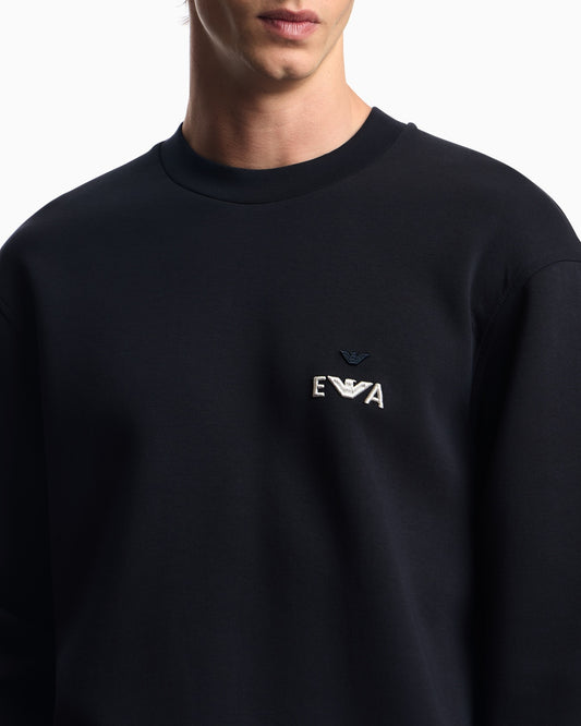 Navy Blue sweatshirt with a logo on a white background
